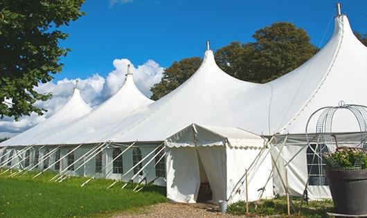 high-quality portable toilets stationed at a wedding, meeting the needs of guests throughout the outdoor reception in Coats NC